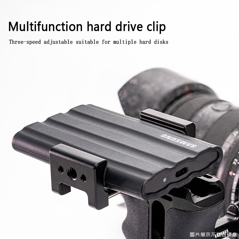 Camera rabbit cage hard drive clamp
